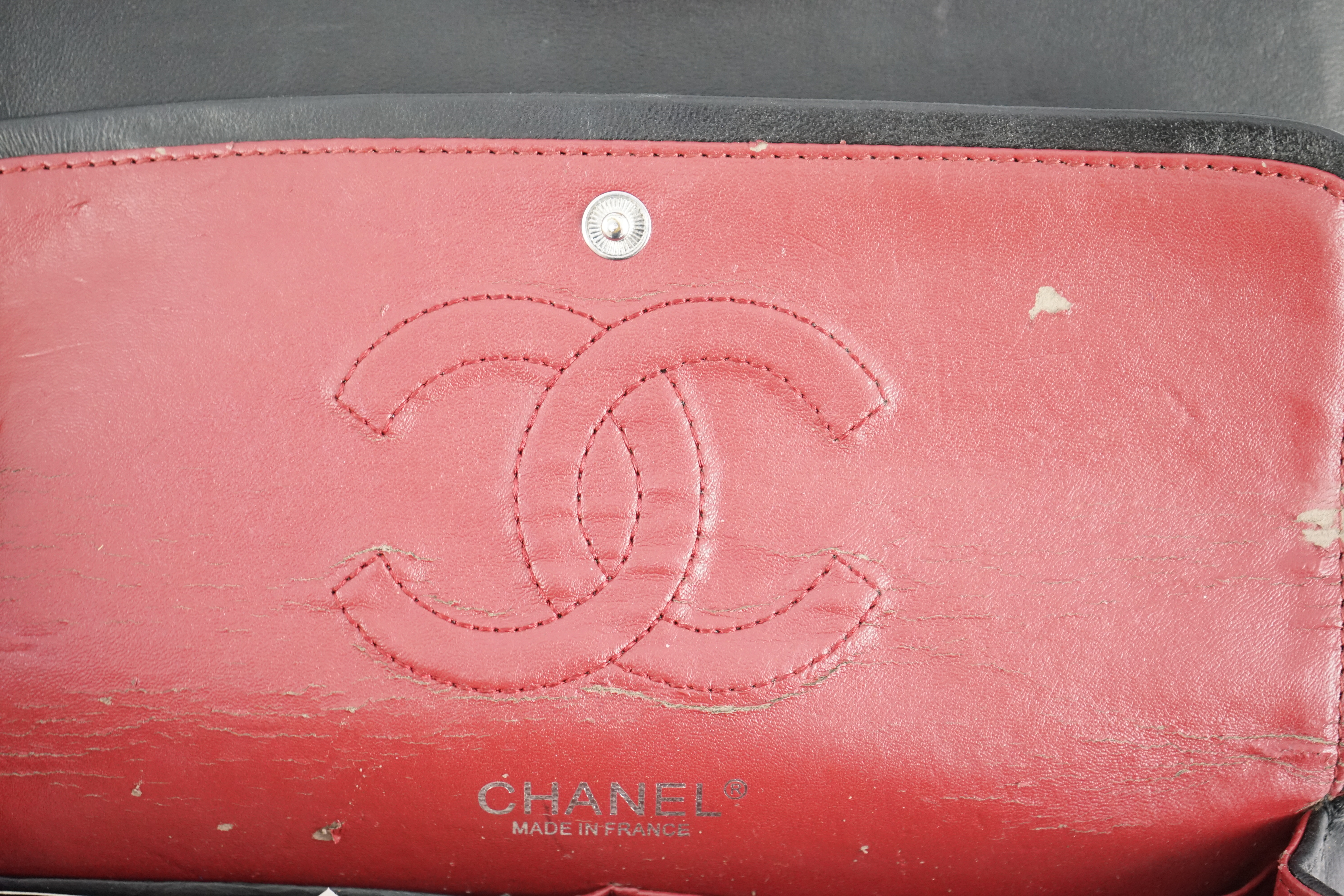 A Chanel classic black quilted leather shoulder bag width 25.5cm, depth 7cm, height 16cm